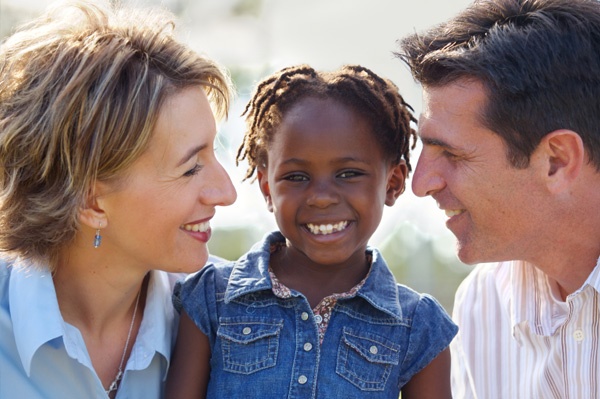 couple-and-adopted-daughter_ly8ovz
